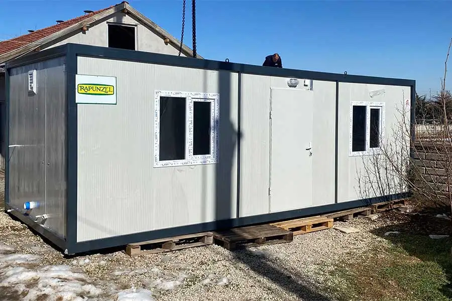 Housing containers provide shelter for affected organic farming families. Housing containers provide shelter for affected organic farming families.